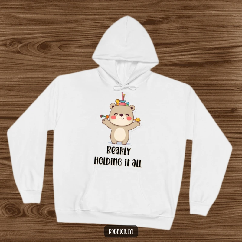 Funny Bear Hoodie featuring a cheerful bear balancing multiple objects on its nose, designed for cozy and humorous wear.