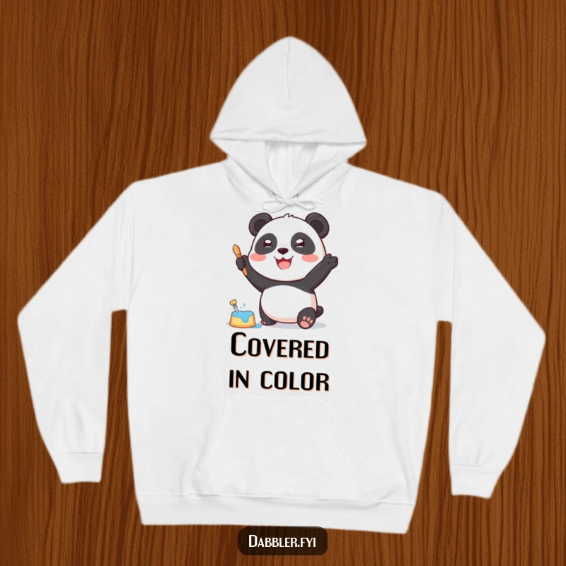 Funny Hoodie: A joyful panda character enthusiastically painting with a sponge, radiating creative and cozy humor.