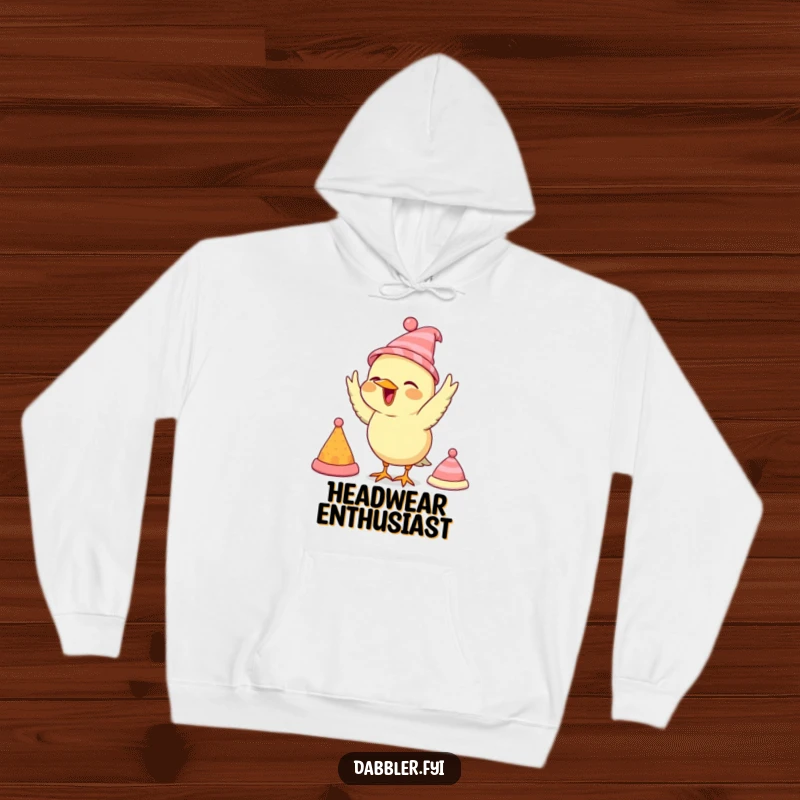 Funny bird hoodie, showcasing a bird trying on several tiny hats, offering warmth and quirky style.