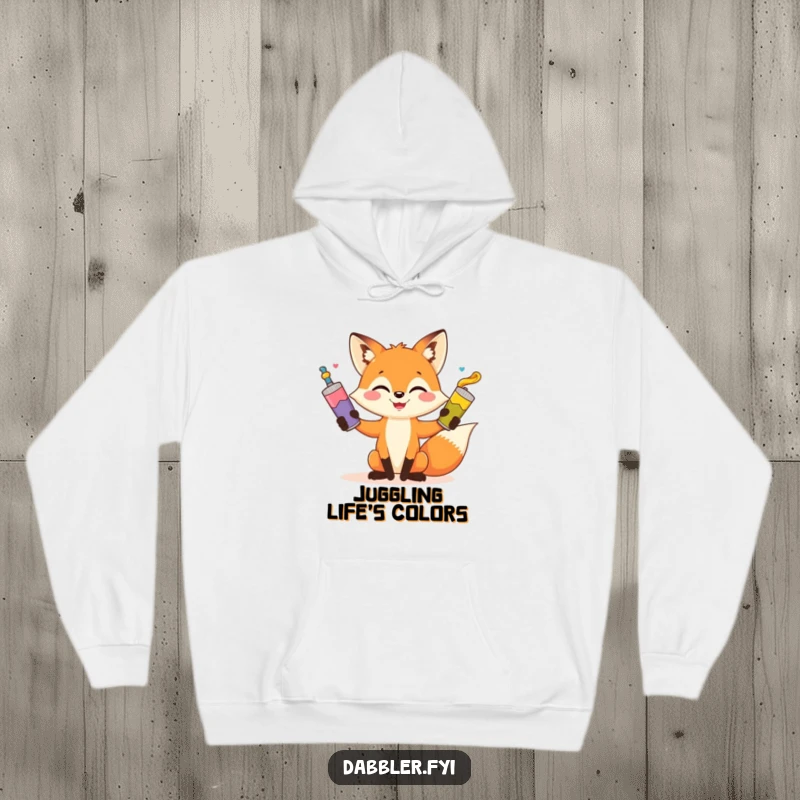Funny fox juggling hoodie, artist fox with paint tubes, cozy, whimsical, humorous art apparel, perfect gift for creatives.