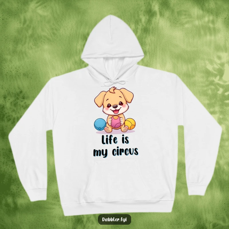 Funny hoodie featuring a cute puppy character humorously juggling colorful balls with a mischievous grin, offering warm and funny comfort.