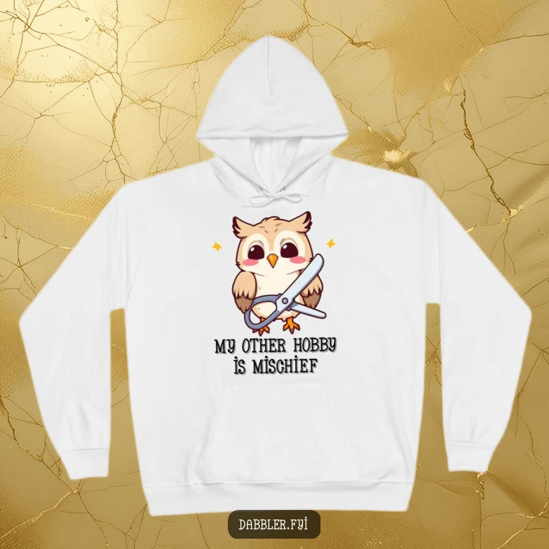 Funny Hoodie: A giggling owl character is hilariously using large scissors to snip colorful paper, a warm and funny apparel.