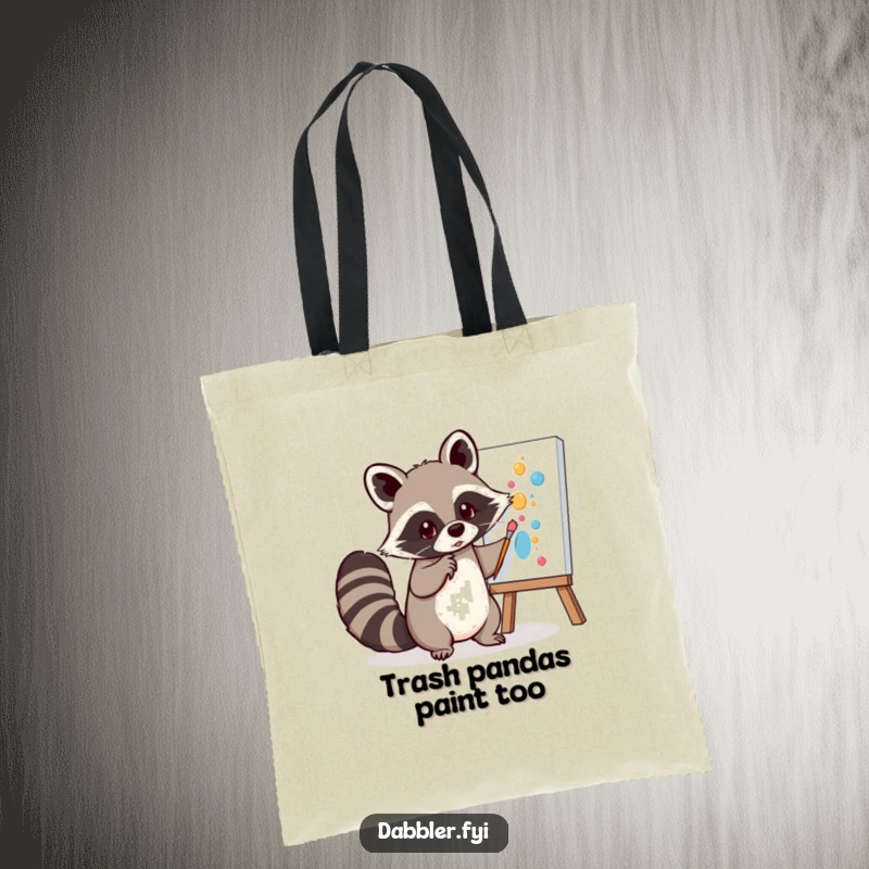 Funny Tote Bag: A mischievous raccoon playfully dabs paint onto a canvas using its tail, perfect for carrying art supplies with humor.